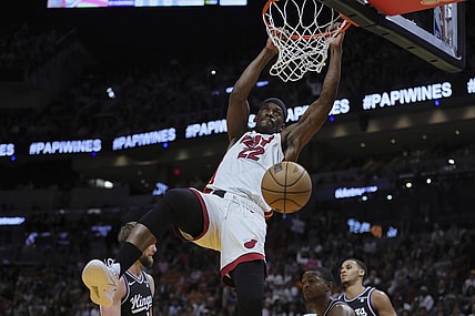 Jan 31, 2024; Miami, Florida, USA; Miami Heat forward Jimmy Butler (22) dunks the basketball against the Sacramento Kings during the third quarter at Kaseya Center. Mandatory Credit: Sam Navarro-USA TODAY Sports