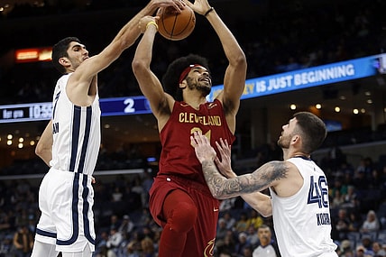 Feb 1, 2024; Memphis, Tennessee, USA; Memphis Grizzlies forward-center Santi Aldama (7) blocks the shot of Cleveland Cavaliers center Jarrett Allen (31) during the first half at FedExForum. Mandatory Credit: Petre Thomas-USA TODAY Sports