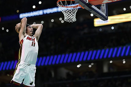 Feb 2, 2024; Washington, District of Columbia, USA; Miami Heat guard Jaime Jaquez Jr. (11) dunks the ball against the Washington Wizards in the first half at Capital One Arena. Mandatory Credit: Geoff Burke-USA TODAY Sports