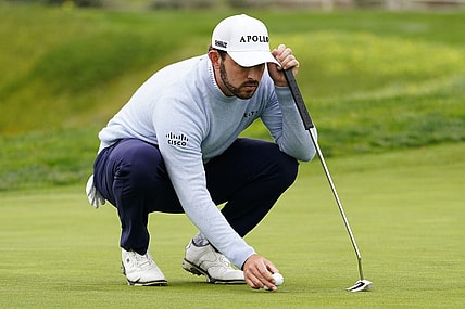 Feb 3, 2024; Pebble Beach, California, USA; Patrick Cantlay lines up his putt on the fifth hole during the third round of the AT&T Pebble Beach Pro-Am golf tournament at Pebble Beach Golf Links. Mandatory Credit: Michael Madrid-USA TODAY Sports