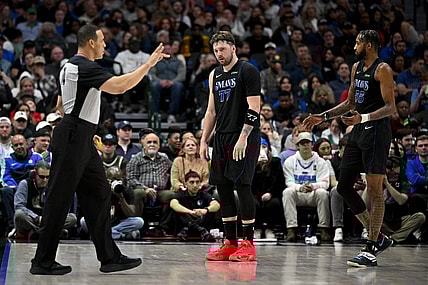 Feb 3, 2024; Dallas, Texas, USA; Dallas Mavericks guard Luka Doncic (77) reacts to being called for a foul by referee Curtis Blair (74) during the second quarter against the Milwaukee Bucks at the American Airlines Center. Mandatory Credit: Jerome Miron-USA TODAY Sports