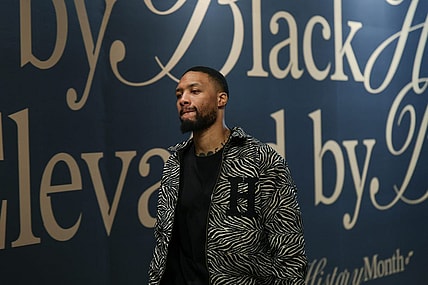 Feb 4, 2024; Salt Lake City, Utah, USA;  Milwaukee Bucks guard Damian Lillard (0) arrives at the Delta Center before the game against the Utah Jazz. Mandatory Credit: Chris Nicoll-USA TODAY Sports
