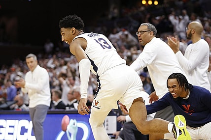 Feb 5, 2024; Charlottesville, Virginia, USA; Virginia Cavaliers guard Ryan Dunn (13) celebrates after dunking the ball against the Miami (Fl) Hurricanes during the second half at John Paul Jones Arena. Mandatory Credit: Amber Searls-USA TODAY Sports