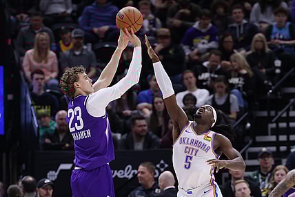 Feb 6, 2024; Salt Lake City, Utah, USA; Utah Jazz forward Lauri Markkanen (23) shoots over Oklahoma City Thunder guard Luguentz Dort (5) during the second quarter at Delta Center. Mandatory Credit: Rob Gray-USA TODAY Sports