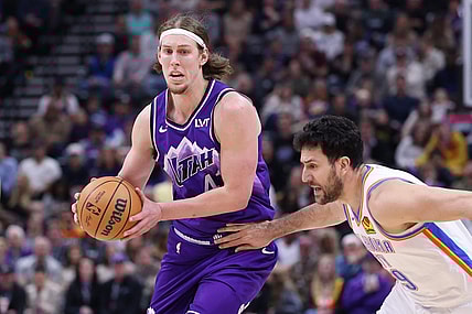 Feb 6, 2024; Salt Lake City, Utah, USA; Utah Jazz forward Kelly Olynyk (41) moves the ball against Oklahoma City Thunder guard Vasilije Micic (29) during the fourth quarter at Delta Center. Mandatory Credit: Rob Gray-USA TODAY Sports