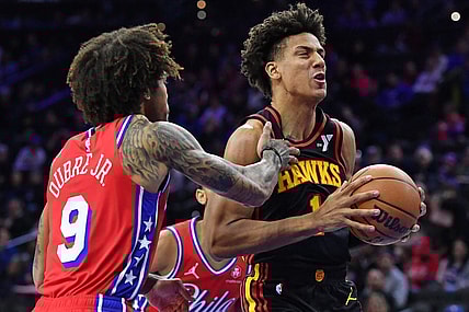 Feb 9, 2024; Philadelphia, Pennsylvania, USA; Atlanta Hawks forward Jalen Johnson (1) drives past Philadelphia 76ers guard Kelly Oubre Jr. (9) during the first quarter at Wells Fargo Center. Mandatory Credit: Eric Hartline-USA TODAY Sports