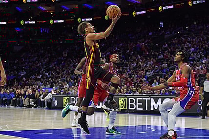 Feb 9, 2024; Philadelphia, Pennsylvania, USA; Atlanta Hawks guard Trae Young (11) drives to the basket past Philadelphia 76ers guard Buddy Hield (17) during the second quarter at Wells Fargo Center. Mandatory Credit: Eric Hartline-USA TODAY Sports
