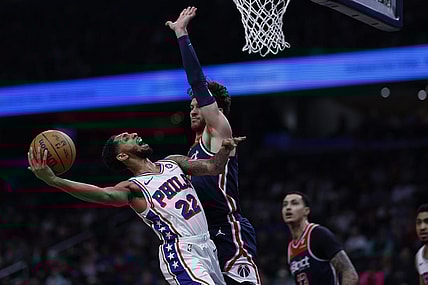 Feb 10, 2024; Washington, District of Columbia, USA; Philadelphia 76ers guard Cameron Payne (22) shoots the ball as Washington Wizards forward Corey Kispert (24) defends in the first half at Capital One Arena. Mandatory Credit: Geoff Burke-USA TODAY Sports