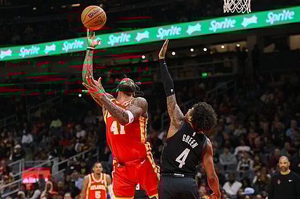 Feb 10, 2024; Atlanta, Georgia, USA; Atlanta Hawks forward Saddiq Bey (41) shoots past Houston Rockets guard Jalen Green (4) in the second quarter at State Farm Arena. Mandatory Credit: Brett Davis-USA TODAY Sports