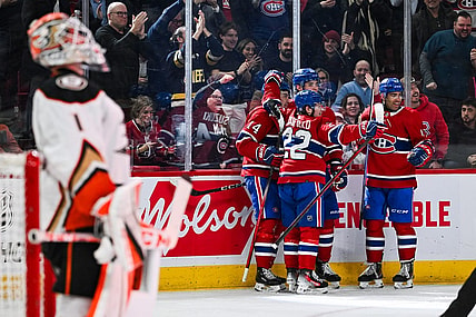 Feb 13, 2024; Montreal, Quebec, CAN; Montreal Canadiens center Nick Suzuki (14) celebrates his first goal of the game against the Anaheim Ducks with his teammates during the second period at Bell Centre. Mandatory Credit: David Kirouac-USA TODAY Sports