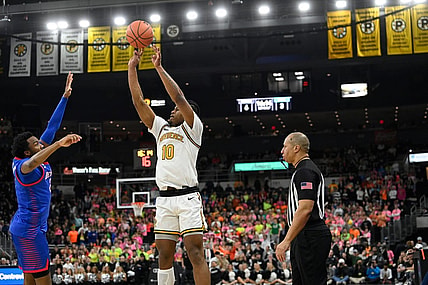 Feb 17, 2024; Providence, Rhode Island, USA; Providence Friars forward Rich Barron (10)  shoots against the DePaul Blue Demons during the first half at Amica Mutual Pavilion. Mandatory Credit: Eric Canha-USA TODAY Sports