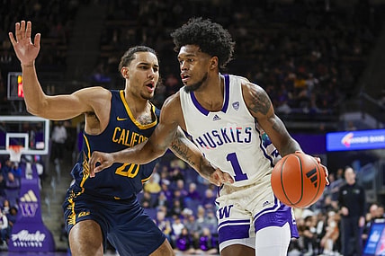 Feb 17, 2024; Seattle, Washington, USA; Washington Huskies forward Keion Brooks Jr. (1) dribbles against California Golden Bears guard Jaylon Tyson (20) during the first half at Alaska Airlines Arena at Hec Edmundson Pavilion. Mandatory Credit: Joe Nicholson-USA TODAY Sports