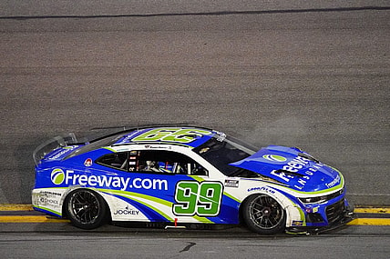 Feb 19, 2024; Daytona Beach, Florida, USA; NASCAR Cup Series driver Daniel Suarez (99) wrecks during the Daytona 500 at Daytona International Speedway. Mandatory Credit: John David Mercer-USA TODAY Sports
