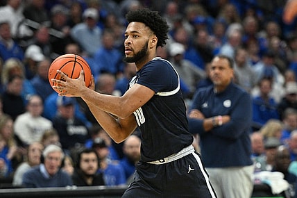 Feb 13, 2024; Omaha, Nebraska, USA;  Georgetown Hoyas guard Jayden Epps (10) passes against the Creighton Bluejays in the first half at CHI Health Center Omaha. Mandatory Credit: Steven Branscombe-USA TODAY Sports