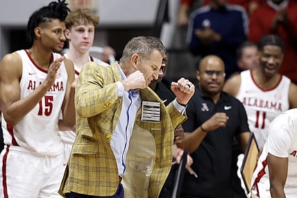 Feb 21, 2024; Tuscaloosa, Alabama, USA; Alabama Crimson Tide head coach Nate Oats reacts after a three pointer during overtime against the Florida Gators at Coleman Coliseum. Mandatory Credit: Butch Dill-USA TODAY Sports