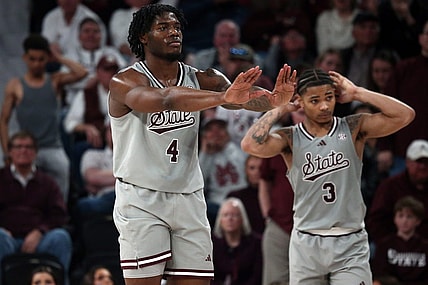 Feb 21, 2024; Starkville, Mississippi, USA; Mississippi State Bulldogs forward Cameron Matthews (4) and guard Shakeel Moore (3) react during the second half against the Mississippi Rebels at Humphrey Coliseum. Mandatory Credit: Petre Thomas-USA TODAY Sports