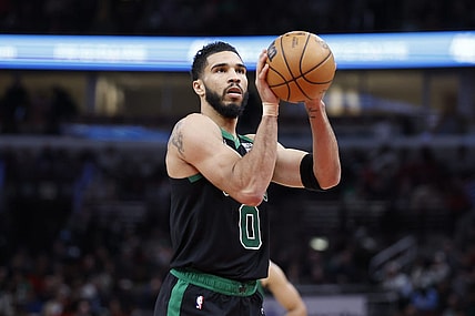Feb 22, 2024; Chicago, Illinois, USA; Boston Celtics forward Jayson Tatum (0) shoots a free throw against the Chicago Bulls during the second half at United Center. Mandatory Credit: Kamil Krzaczynski-USA TODAY Sports