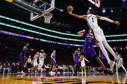 Feb 23, 2024; Los Angeles, California, USA; San Antonio Spurs center Victor Wembanyama (1) shoots against Los Angeles Lakers center Jaxson Hayes (11) during the second half at Crypto.com Arena. Mandatory Credit: Gary A. Vasquez-USA TODAY Sports