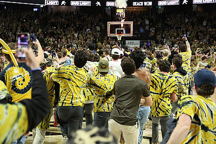 Feb 24, 2024; Winston-Salem, North Carolina, USA;  Wake Forest Demon Deacons students storm the court after Wake Forest wins at Lawrence Joel Veterans Memorial Coliseum. Mandatory Credit: Cory Knowlton-USA TODAY Sports