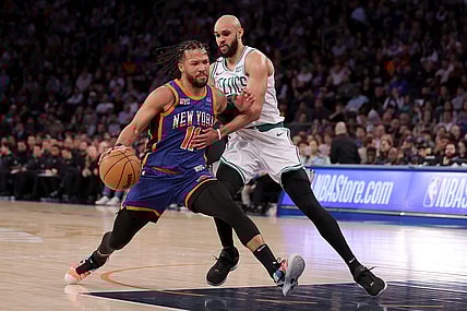 Feb 24, 2024; New York, New York, USA; New York Knicks guard Jalen Brunson (11) drives to the basket against Boston Celtics guard Derrick White (9) during the third quarter at Madison Square Garden. Mandatory Credit: Brad Penner-USA TODAY Sports
