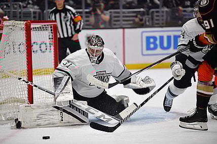Feb 24, 2024; Los Angeles, California, USA;  Los Angeles Kings goaltender David Rittich (31) defends the goal against Anaheim Ducks center Leo Carlsson (91) during the first period at Crypto.com Arena. Mandatory Credit: Gary A. Vasquez-USA TODAY Sports