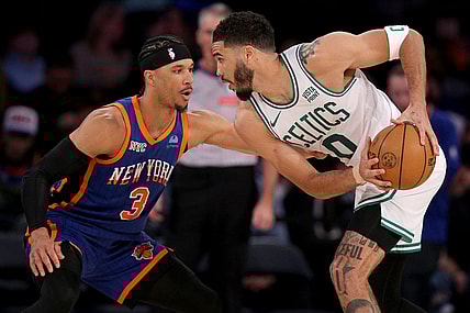 Feb 24, 2024; New York, New York, USA; Boston Celtics forward Jayson Tatum (0) controls the ball against New York Knicks guard Josh Hart (3) during the third quarter at Madison Square Garden. Mandatory Credit: Brad Penner-USA TODAY Sports
