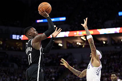 Feb 24, 2024; Minneapolis, Minnesota, USA; Brooklyn Nets guard Dennis Schroder (17) shoots as Minnesota Timberwolves guard Nickeil Alexander-Walker (9) defends during the second half at Target Center. Mandatory Credit: Matt Krohn-USA TODAY Sports