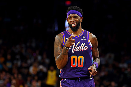 Feb 25, 2024; Phoenix, Arizona, USA; Phoenix Suns forward Royce O'Neale (00) reacts after a play during the second quarter of the game against the Los Angeles Lakers at Footprint Center. Mandatory Credit: Mark J. Rebilas-USA TODAY Sports