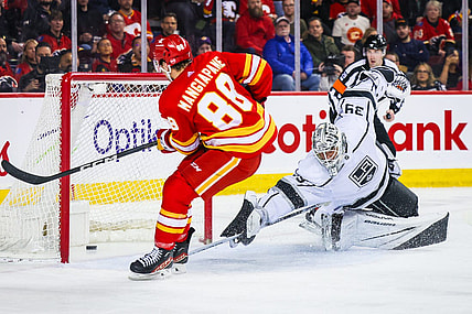 Feb 27, 2024; Calgary, Alberta, CAN; Calgary Flames left wing Andrew Mangiapane (88) scores a goal against Los Angeles Kings goaltender Cam Talbot (39) during the second period at Scotiabank Saddledome. Mandatory Credit: Sergei Belski-USA TODAY Sports