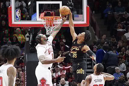 Feb 28, 2024; Chicago, Illinois, USA; Chicago Bulls center Andre Drummond (3) defends Cleveland Cavaliers forward Isaac Okoro (35) during the first quarter at United Center. Mandatory Credit: David Banks-USA TODAY Sports