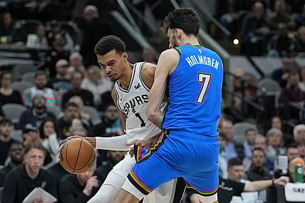 Feb 29, 2024; San Antonio, Texas, USA;  San Antonio Spurs center Victor Wembanyama (1) drives in against Oklahoma City Thunder forward Chet Holmgren (7) in the first half at Frost Bank Center. Mandatory Credit: Daniel Dunn-USA TODAY Sports