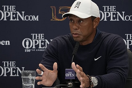 Jul 12, 2022; St. Andrews, Fife, SCT; Tiger Woods talks with the media during a press conference prior to the 150th Open Championship golf tournament at St. Andrews Old Course. Mandatory Credit: Michael Madrid-USA TODAY Sports