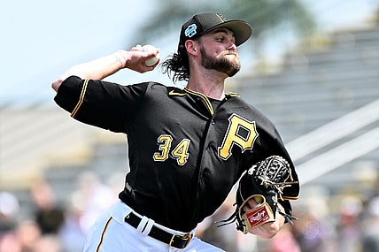 Mar 5, 2023; Bradenton, Florida, USA; Pittsburgh Pirates pitcher JT Brubaker (34) throws a pitch in the first inning of a spring training game against the Minnesota Twins at LECOM Park. Mandatory Credit: Jonathan Dyer-USA TODAY Sports