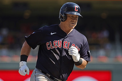Aug 30, 2023; Minneapolis, Minnesota, USA; Cleveland Guardians first baseman Kole Calhoun (56) runs the bases on his three-run home run against the Minnesota Twins in the tenth inning at Target Field. Mandatory Credit: Bruce Kluckhohn-USA TODAY Sports