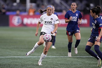 Oct 6, 2023; Seattle, Washington, USA; Washington Spirit forward Ashley Hatch (33) controls the ball as OL Reign defends during the first half at Lumen Field. Mandatory Credit: Stephen Brashear-USA TODAY Sports