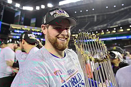 Nov 1, 2023; Phoenix, AZ, USA; Texas Rangers starting pitcher Jordan Montgomery (52) celebrates defeating the Arizona Diamondbacks to win the World Series  in game five of the 2023 World Series at Chase Field. Mandatory Credit: Matt Kartozian-USA TODAY Sports