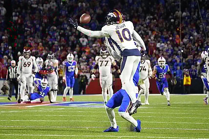 Nov 13, 2023; Orchard Park, New York, USA; Buffalo Bills cornerback Taron Johnson (7) pushes Denver Broncos wide receiver Jerry Jeudy (10) attempting to make a catch and is called for pass interference during the second half at Highmark Stadium. Mandatory Credit: Gregory Fisher-USA TODAY Sports