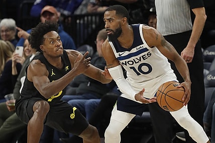 Nov 30, 2023; Minneapolis, Minnesota, USA; Utah Jazz guard Collin Sexton (2) defends against the Minnesota Timberwolves guard Mike Conley (10) in the fourth quarter at Target Center. Mandatory Credit: Bruce Kluckhohn-USA TODAY Sports