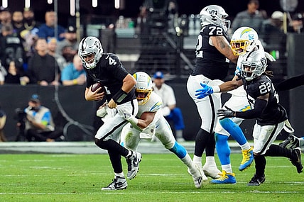 Dec 14, 2023; Paradise, Nevada, USA; Los Angeles Chargers linebacker Eric Kendricks (6) sacks Las Vegas Raiders quarterback Aidan O'Connell (4) in the third quarter at Allegiant Stadium. Mandatory Credit: Stephen R. Sylvanie-USA TODAY Sports