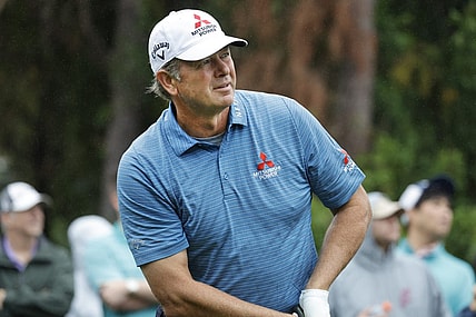 Dec 17, 2023; Orlando, Florida, USA;  Retief Goosen plays his shot from the first tee during the PNC Championship at The Ritz-Carlton Golf Club. Mandatory Credit: Reinhold Matay-USA TODAY Sports