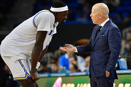 January 14, 2024; Los Angeles, California, USA; UCLA Bruins head coach Mick Cronin speaks to forward Adem Bona (3) during the second half at Pauley Pavilion. Mandatory Credit: Gary A. Vasquez-USA TODAY Sports