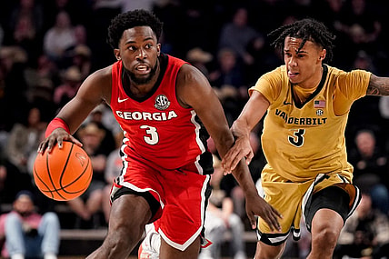Georgia guard Noah Thomasson (3) is guarded by Vanderbilt guard Paul Lewis (3) during the second half at Memorial Gym in Nashville, Tenn., Wednesday, Feb. 21, 2024.