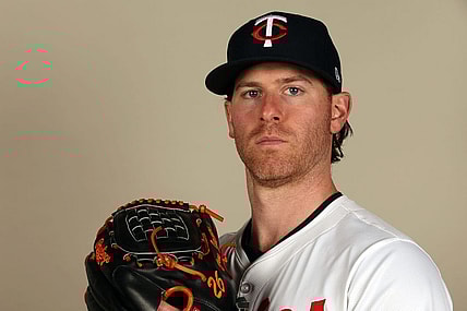 Feb 22, 2024; Lee County, FL, USA;  Minnesota Twins starting pitcher Anthony DeSclafani (21) poses for a photo during photo day at Hammond Stadium. Mandatory Credit: Kim Klement Neitzel-USA TODAY Sports