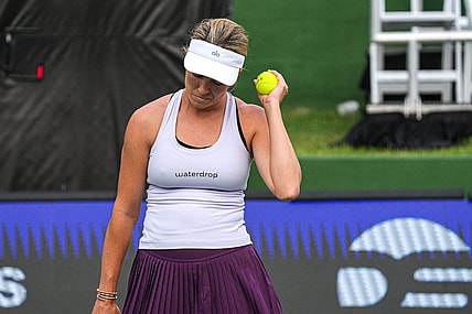 American Tennis Player Danielle Collins holds up a ball after scoring during her ATX Open Round 16 match against Caty McNally at the Westwood Country Club on Thursday, March. 2, 2023 in Austin.