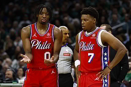 Feb 27, 2024; Boston, Massachusetts, USA; Philadelphia 76ers' Tyrese Maxey (0) talks with Kyle Lowry (7) during the second half of their loss to the Boston Celtics at TD Garden. Mandatory Credit: Winslow Townson-USA TODAY Sports