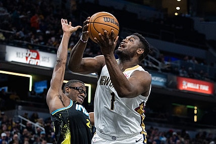 Feb 28, 2024; Indianapolis, Indiana, USA; New Orleans Pelicans forward Zion Williamson (1) shoots the ball while Indiana Pacers forward Jalen Smith (25) defends in the first half at Gainbridge Fieldhouse. Mandatory Credit: Trevor Ruszkowski-USA TODAY Sports