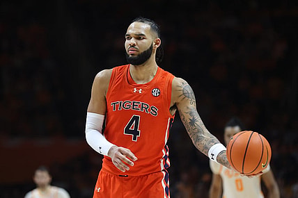 Feb 28, 2024; Knoxville, Tennessee, USA; Auburn Tigers forward Johni Broome (4) looks to move the ball against the Tennessee Volunteers during the second half at Thompson-Boling Arena at Food City Center. Mandatory Credit: Randy Sartin-USA TODAY Sports