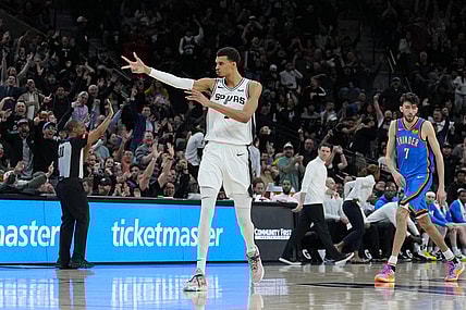Feb 29, 2024; San Antonio, Texas, USA;  San Antonio Spurs center Victor Wembanyama (1) celebrates a three point shot in the second half against the Oklahoma City Thunder at Frost Bank Center. Mandatory Credit: Daniel Dunn-USA TODAY Sports