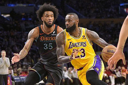 Feb 29, 2024; Los Angeles, California, USA;  Washington Wizards forward Marvin Bagley III (35) guards Los Angeles Lakers forward LeBron James (23) in the first half at Crypto.com Arena. Mandatory Credit: Jayne Kamin-Oncea-USA TODAY Sports