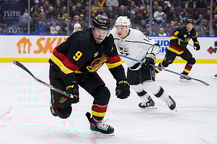 Feb 29, 2024; Vancouver, British Columbia, CAN; Vancouver Canucks forward J.T. Miller (9) skates after the loose puck against the Los Angeles Kings in the third period at Rogers Arena. Kings won 5-1. Mandatory Credit: Bob Frid-USA TODAY Sports